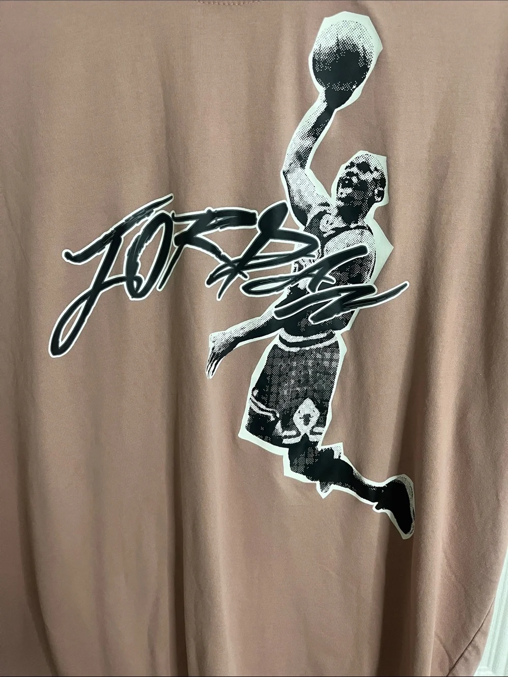 Jordan Men’s Short Sleeve Graphic Tee in Mauve Pink